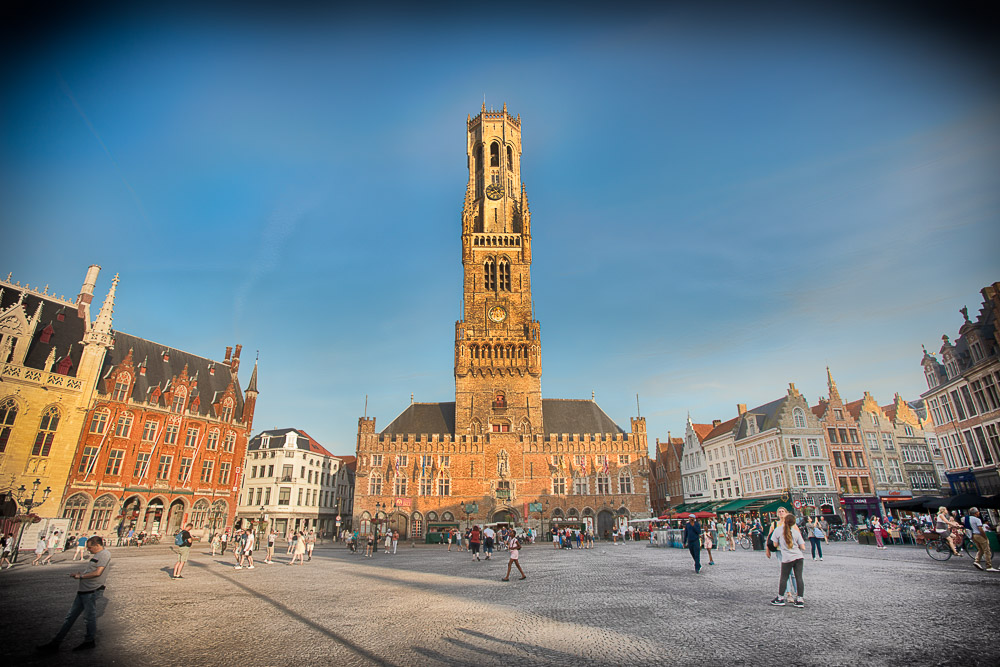 Bruges Belfry from Marketplace with blue sky