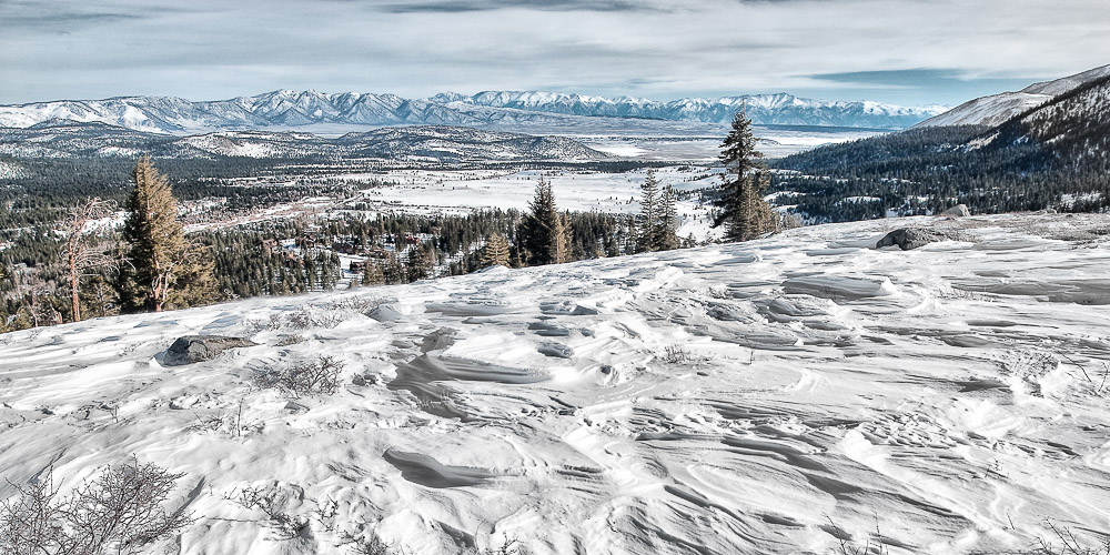 view of mammoth lakes california from panorama dome with snow