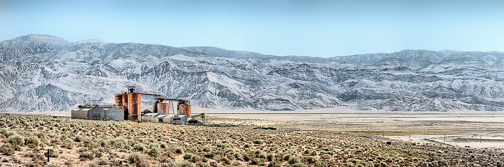 factory at the north end of owens lake with mountains in background