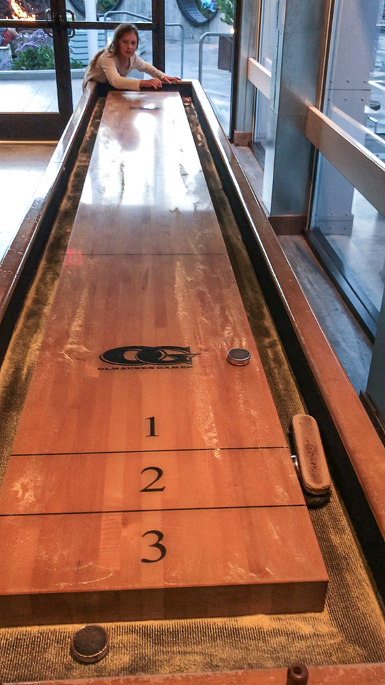 kate playing shuffle board at hotel zephyr in san francisco