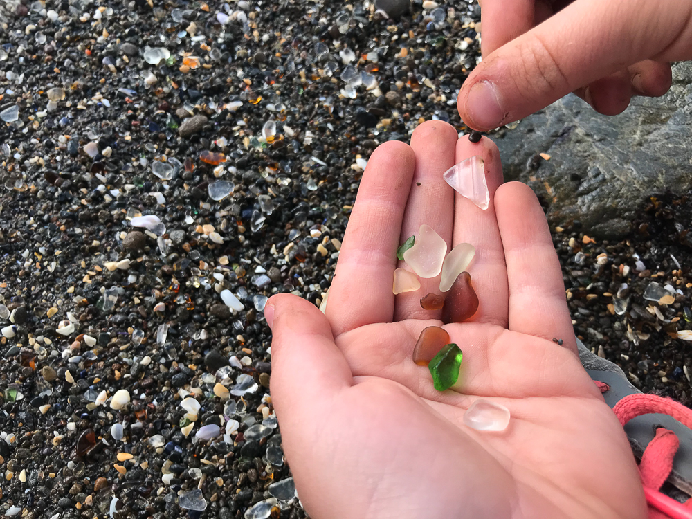katie holding glass beads at glass beach
