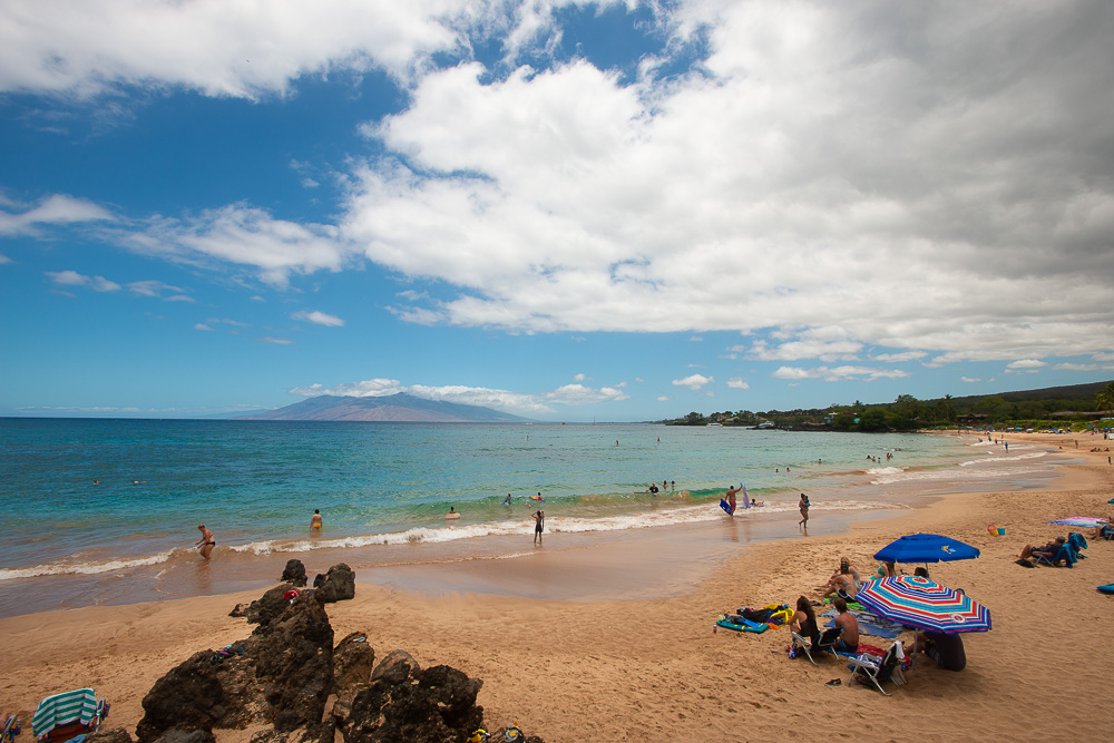 maluaka beach maui hawaii with clouds