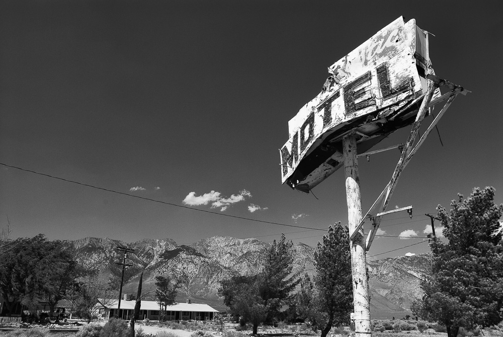 old falling apart motel sign along us 395
