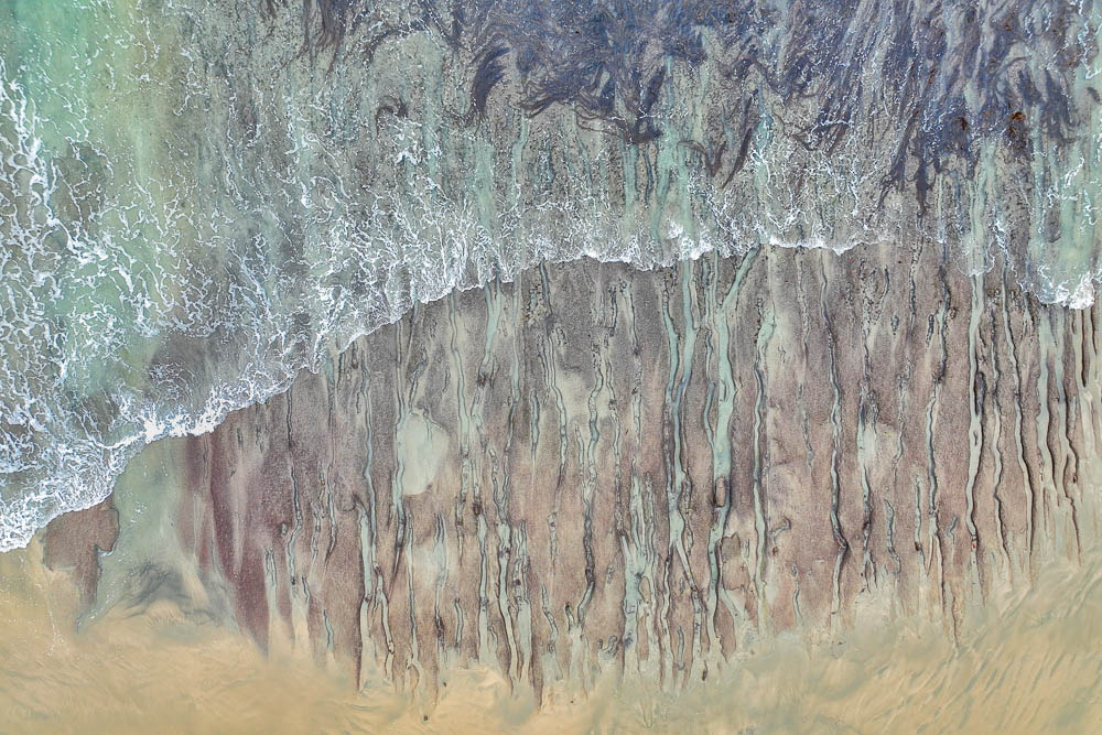 rock reef during kings low tide shot from drone kerckhoffs