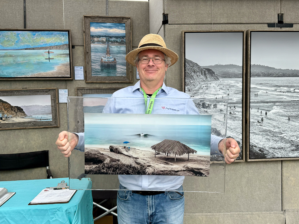 roy holding all mine photo cast in resin