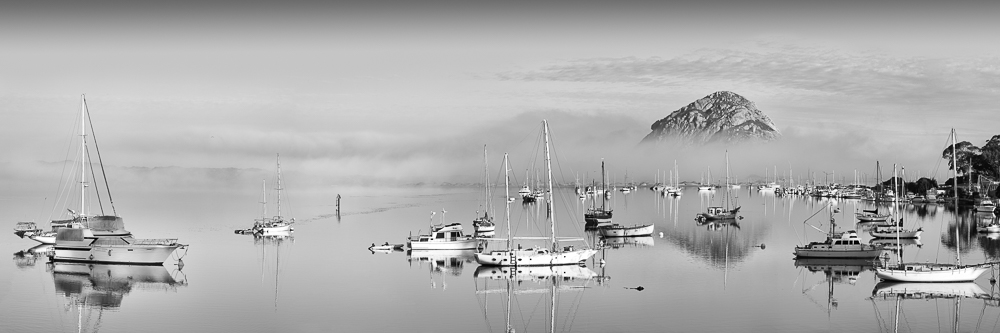 serene morro bay morro rock boats with partial fog black and white