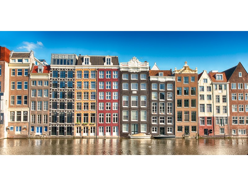 tall houses at canal in amsterdam 800x600